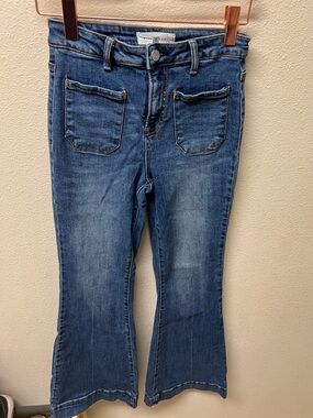 High-Rise Blue Flare Jeans with Front Patch Pockets